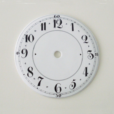 Faïence wijzerplaat. Diameter 18,7 cm