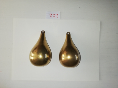 Gewichten voor een oude wandklok.
