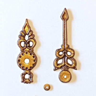 Wijzerset van gegoten messing voor Zaanse klok